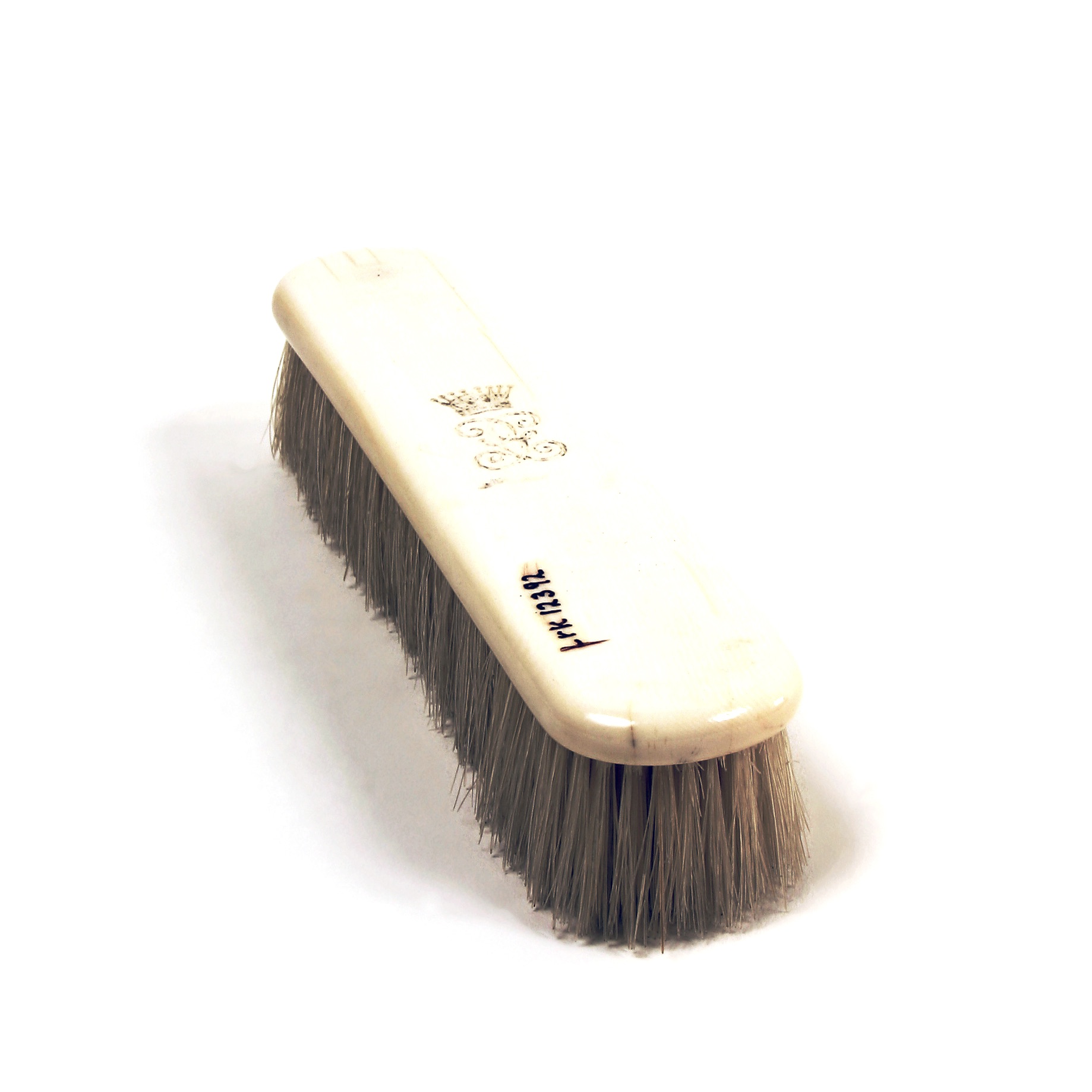 Ivory grooming brush with natural bristles, crowned G monogram and Leuchars & Son London stamp.