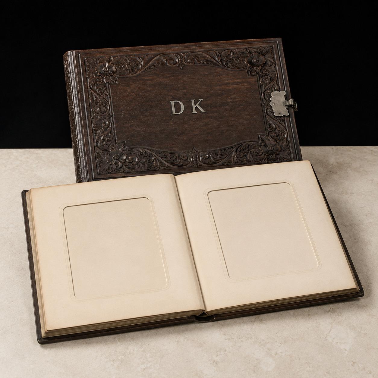 Editorial reconstruction of the carved photograph album open to two empty cabinet-card apertures.