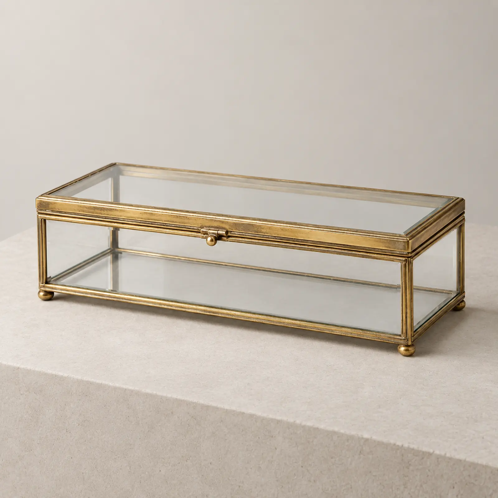 Editorial reconstruction of the closed box in a restrained presentation setting.